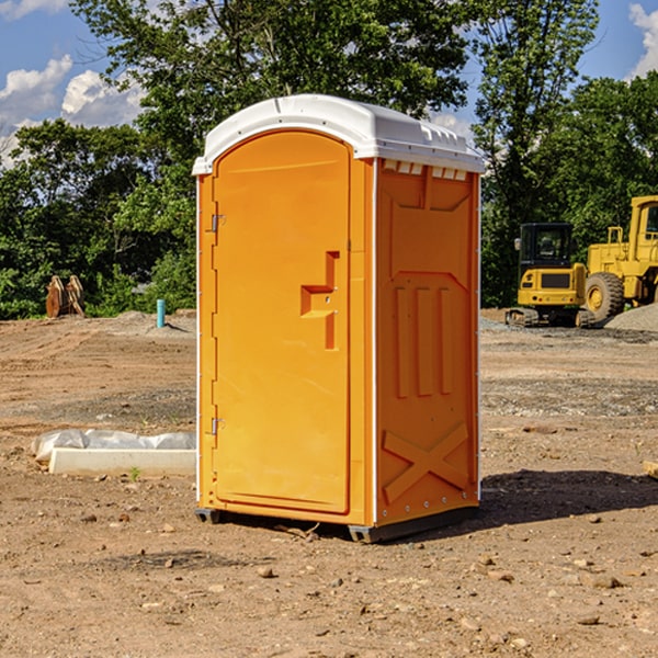 how often are the porta potties cleaned and serviced during a rental period in Lowell